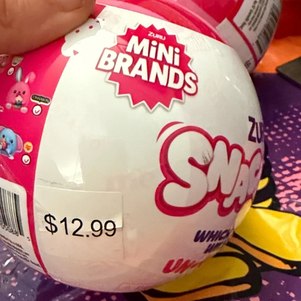Two Zuru Snackles Party Favor Ball - Pink and White